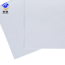 Tissu non-tissé Spunlace blanc gaufré de bonne qualité